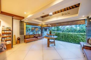 Posezení v ubytování De Munut Balinese Resort