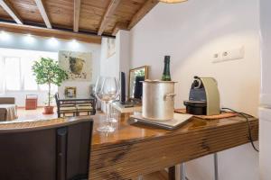 Kuchyň nebo kuchyňský kout v ubytování TGH Acogedor Duplex en Málaga + 19 fotografií