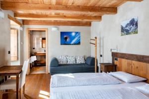 Giường trong phòng chung tại Albergo Locanda Mistral