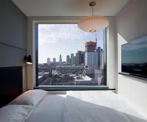 a hotel room with a view of the ocean at citizenM Boston North Station in Boston