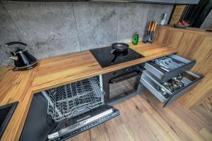 Kuchyňa alebo kuchynka v ubytovaní Apartament Portowa