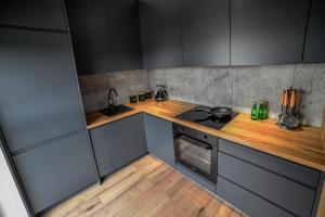 Kuchyňa alebo kuchynka v ubytovaní Apartament Portowa