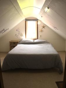 Posteľ alebo postele v izbe v ubytovaní Small, cute and cozy little holiday home