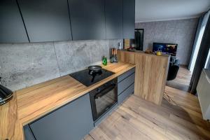 Kuchyňa alebo kuchynka v ubytovaní Apartament Portowa