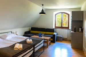 Łóżko lub łóżka w pokoju w obiekcie Hotel Spichlerz Pierwszy SPA & WELLNESS