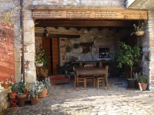 Patio nebo venkovní prostory v ubytování B&B Il Melograno del Garda