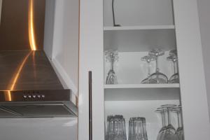 Kuchyň nebo kuchyňský kout v ubytování Apartment Simone