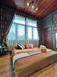 Giường trong phòng chung tại @ Loft