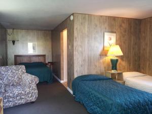 Postel nebo postele na pokoji v ubytování Ocean Avenue Inn