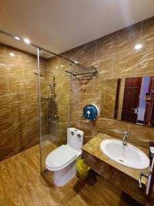 Koupelna v ubytování Hoàng Gia Hotel Côn Đảo + 37 fotografií