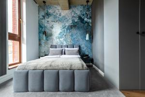 Posteľ alebo postele v izbe v ubytovaní Homewell Boutique Apartments Stare Miasto