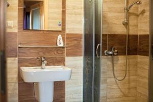 Koupelna v ubytování Domki Natalia Łeba blisko centrum + 59 fotografií