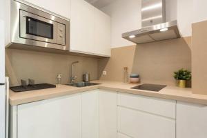Kuchyň nebo kuchyňský kout v ubytování TGH/ Málaga center luxury style