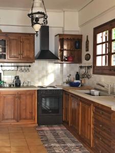 Kjøkken eller kjøkkenkrok på Gaia (Γαία) guest house