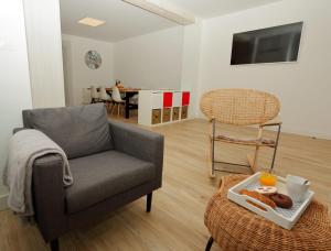 Ein Sitzbereich in der Unterkunft Home Sweet Home Main St Pamplona