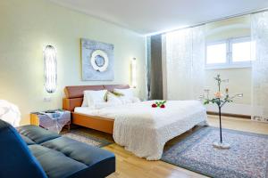 Łóżko lub łóżka w pokoju w obiekcie Schlosshotel Rosenau Superior