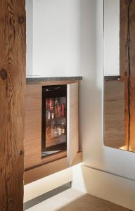 a kitchen with an oven with drinks in it at Copenhagen Admiral Hotel in Copenhagen