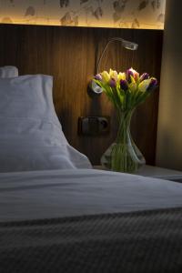 Voodi või voodid majutusasutuse Hotel Prichovice toas