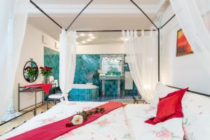 Łóżko lub łóżka w pokoju w obiekcie Schlosshotel Rosenau Superior