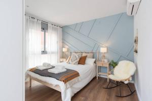 A bed or beds in a room at TGH/ Málaga center western style