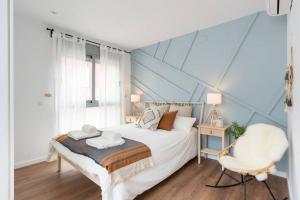 A bed or beds in a room at TGH/ Málaga center western style