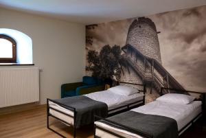 Łóżko lub łóżka w pokoju w obiekcie Hotel Spichlerz Pierwszy SPA & WELLNESS