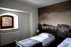 Łóżko lub łóżka w pokoju w obiekcie Hotel Spichlerz Pierwszy SPA & WELLNESS