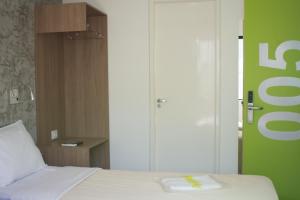 Postel nebo postele na pokoji v ubytování Anhembi Hostel