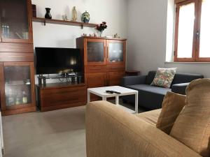 GRAN CASA RURAL CON PATIO EN ENCINAREJO DE CÓRDOBA TV 또는 엔터테인먼트 센터