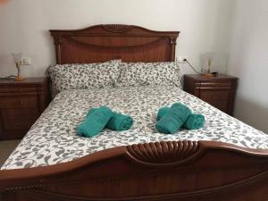 Llit o llits en una habitació de GRAN CASA RURAL CON PATIO EN ENCINAREJO DE CÓRDOBA