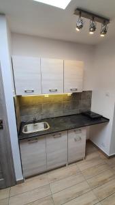 Kuchyňa alebo kuchynka v ubytovaní Apartamenty Hetmańska - 24h Shop