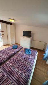 Posteľ alebo postele v izbe v ubytovaní Apartamenty Hetmańska - 24h Shop