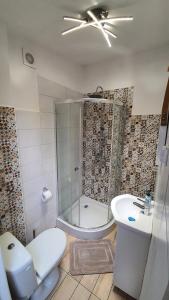 Kúpeľňa v ubytovaní Apartamenty Hetmańska - 24h Shop