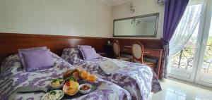 Uma cama ou camas num quarto em Api IV Zakopane