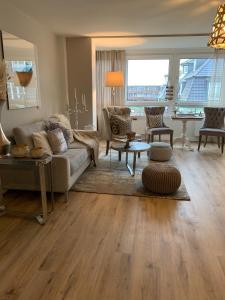 Posezení v ubytování Inselliebe Deluxe Apartement/ Studio