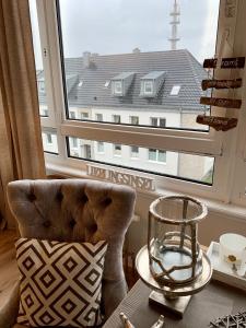 Posezení v ubytování Inselliebe Deluxe Apartement/ Studio