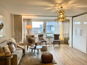 Posezení v ubytování Inselliebe Deluxe Apartement/ Studio