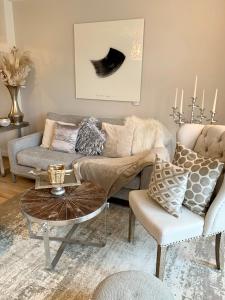 Posezení v ubytování Inselliebe Deluxe Apartement/ Studio