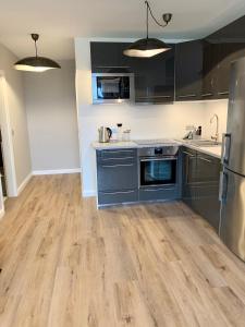 Kuchyň nebo kuchyňský kout v ubytování Inselliebe Deluxe Apartement/ Studio