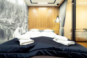 Posteľ alebo postele v izbe v ubytovaní CHARDONNAY APARTMENT ZAKOPANE Centrum Jagiellońska Residence
