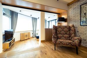 Televízia a/alebo spoločenská miestnosť v ubytovaní CHARDONNAY APARTMENT ZAKOPANE Centrum Jagiellońska Residence
