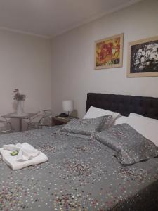 Ein Bett oder Betten in einem Zimmer der Unterkunft Hotel Athenas e Convenções