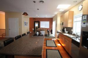 a kitchen with a table and a counter top at 96 Mays Way, SOUTH Bethany Beach in Bethany Beach