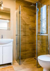 Kúpeľňa v ubytovaní Apartamenty-Obok