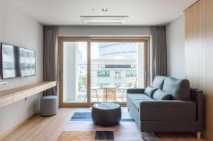 Кът за сядане в Connect Busan Hotel & Residence