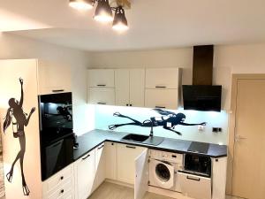 A kitchen or kitchenette at Sea View NewApartment-Bulgaria-Chernomorets