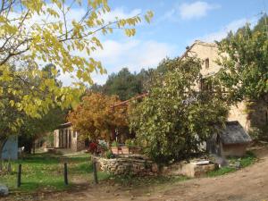 une ancienne maison dans le village de la personne dans l'établissement La Casa de la Montaña, à Cortes de Arenoso
