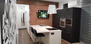 Köök või kööginurk majutusasutuses PICASSO CALLAO WiFi FREE