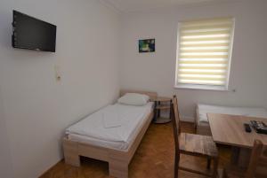 Voodi või voodid majutusasutuse Nürtingen Zimmer toas