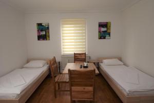 מיטה או מיטות בחדר ב-Nürtingen Zimmer